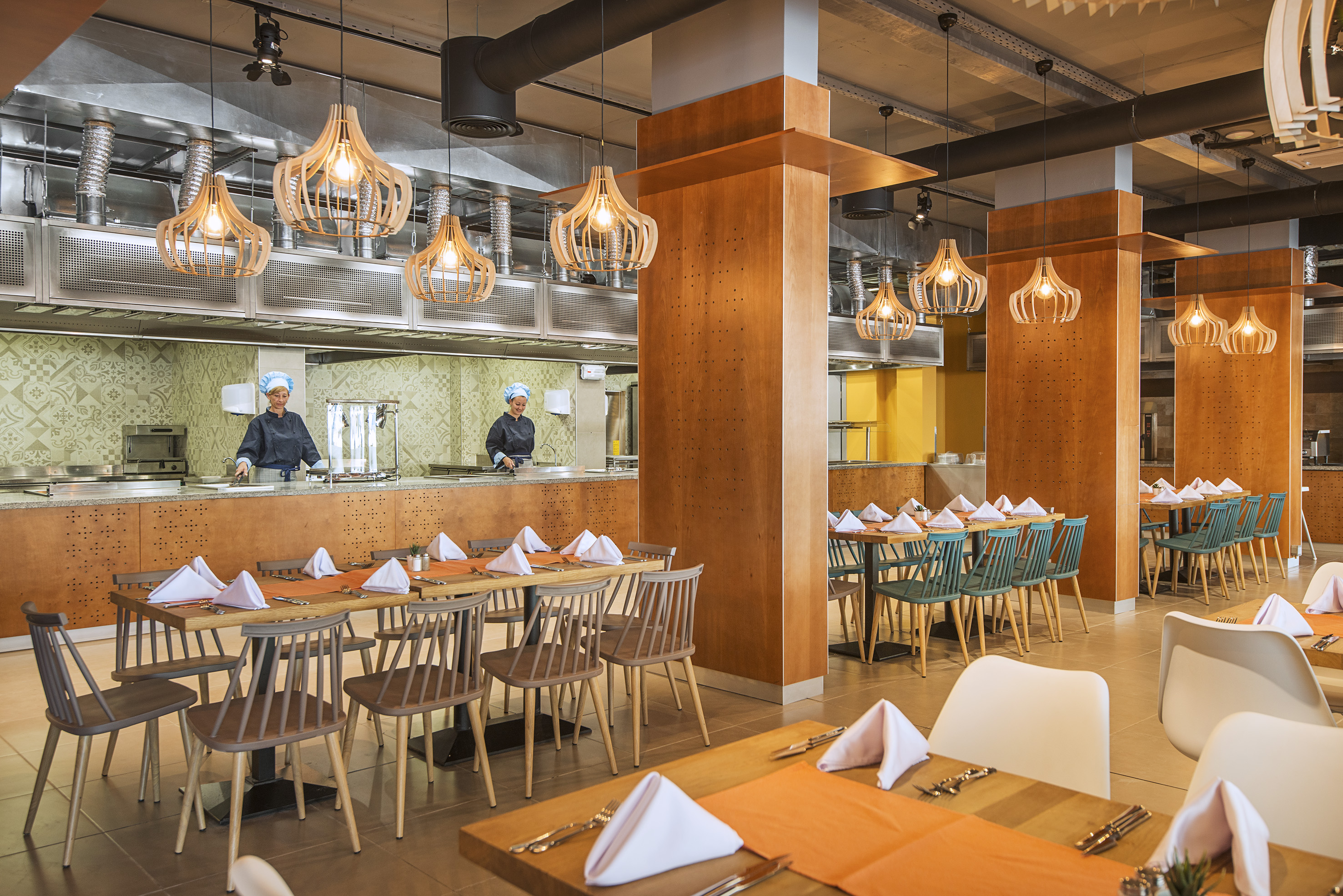 a restaurant with tables and chairs