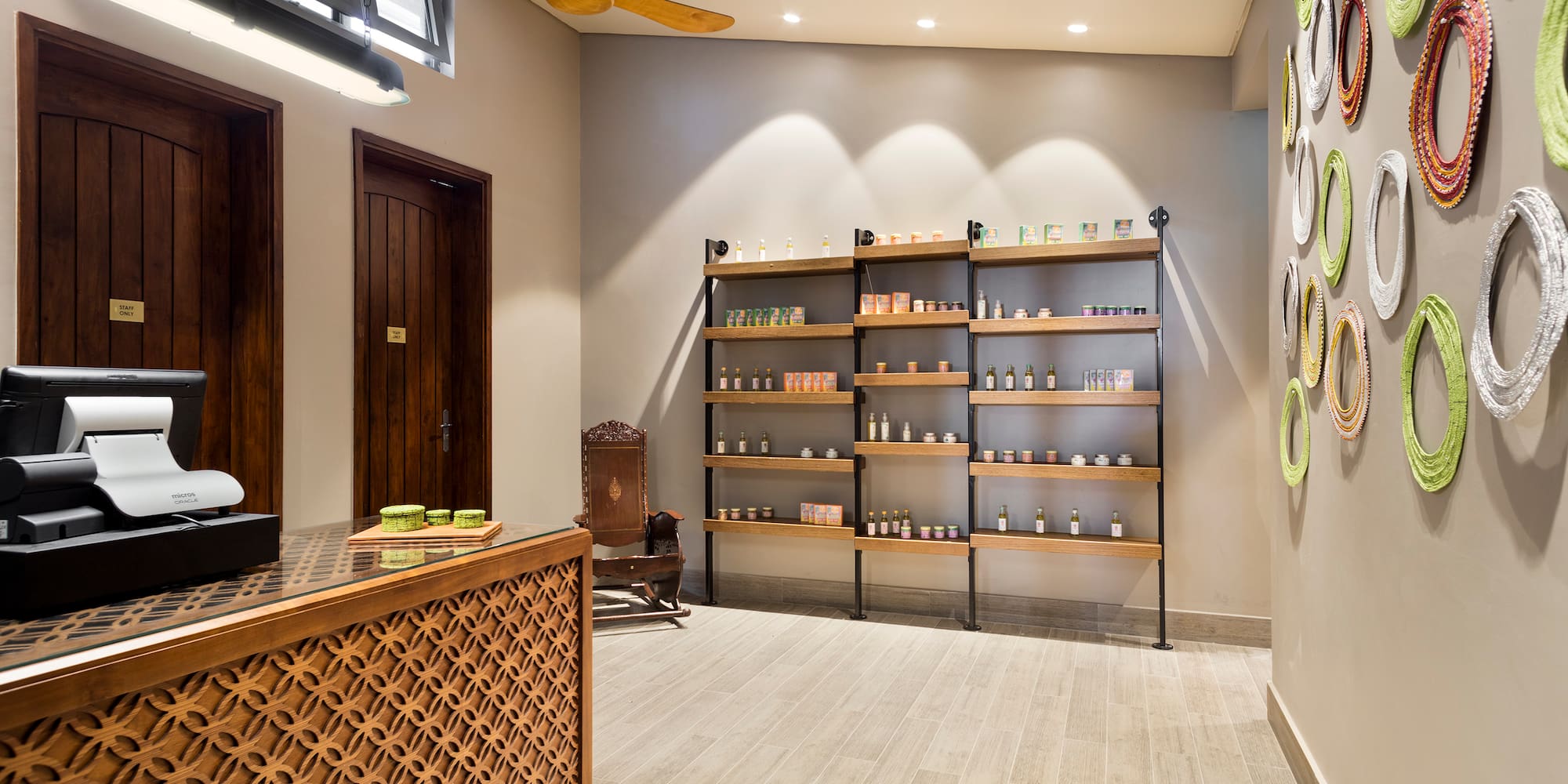 a room with shelves and a fan
