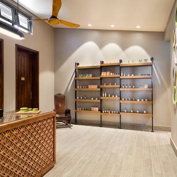 a room with shelves and a fan