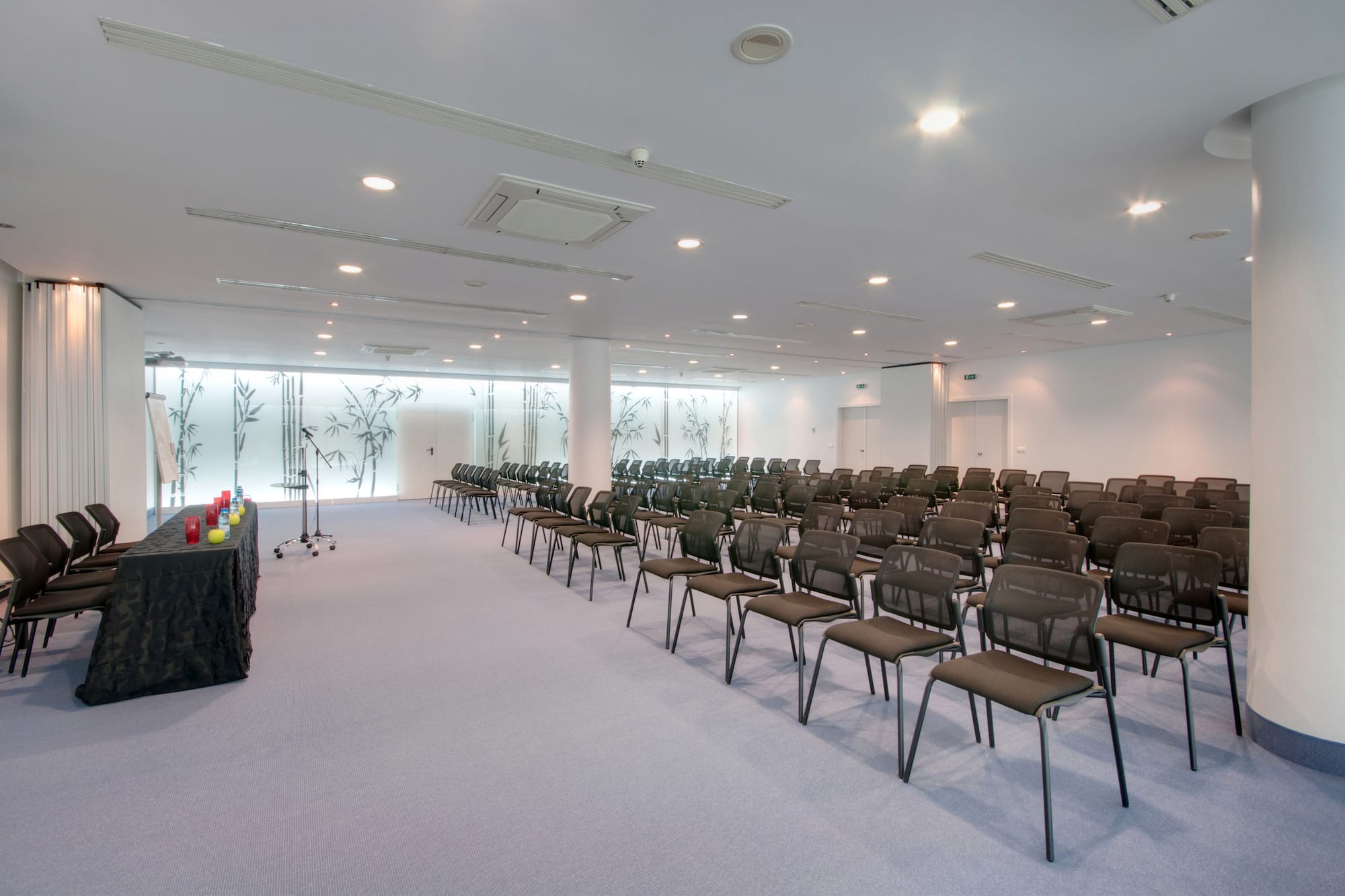 a room with rows of chairs