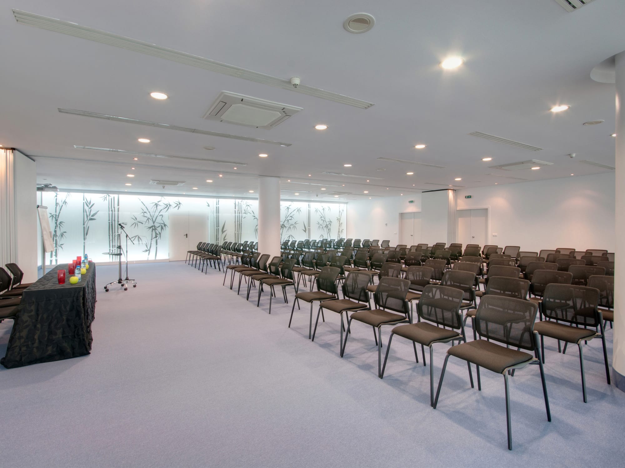 a room with rows of chairs