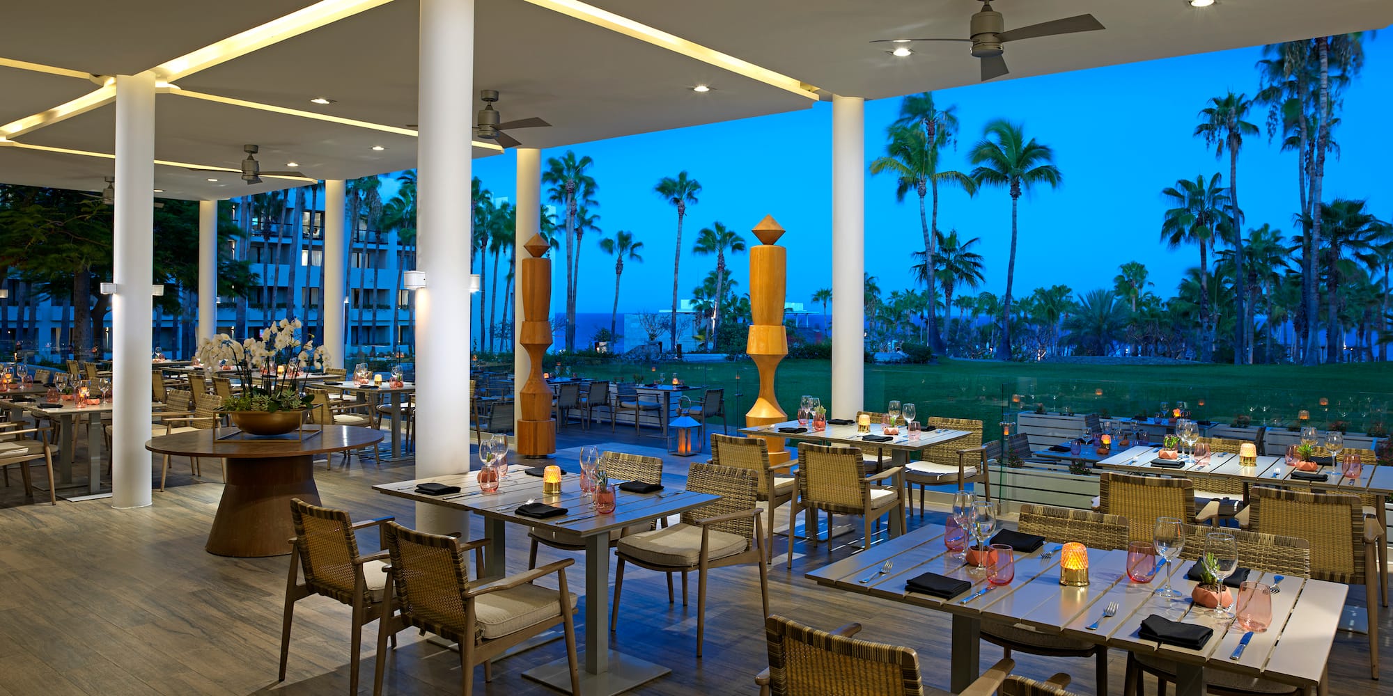 a restaurant with tables and chairs