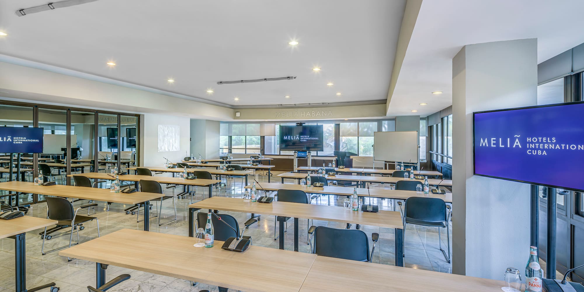 a room with tables and chairs