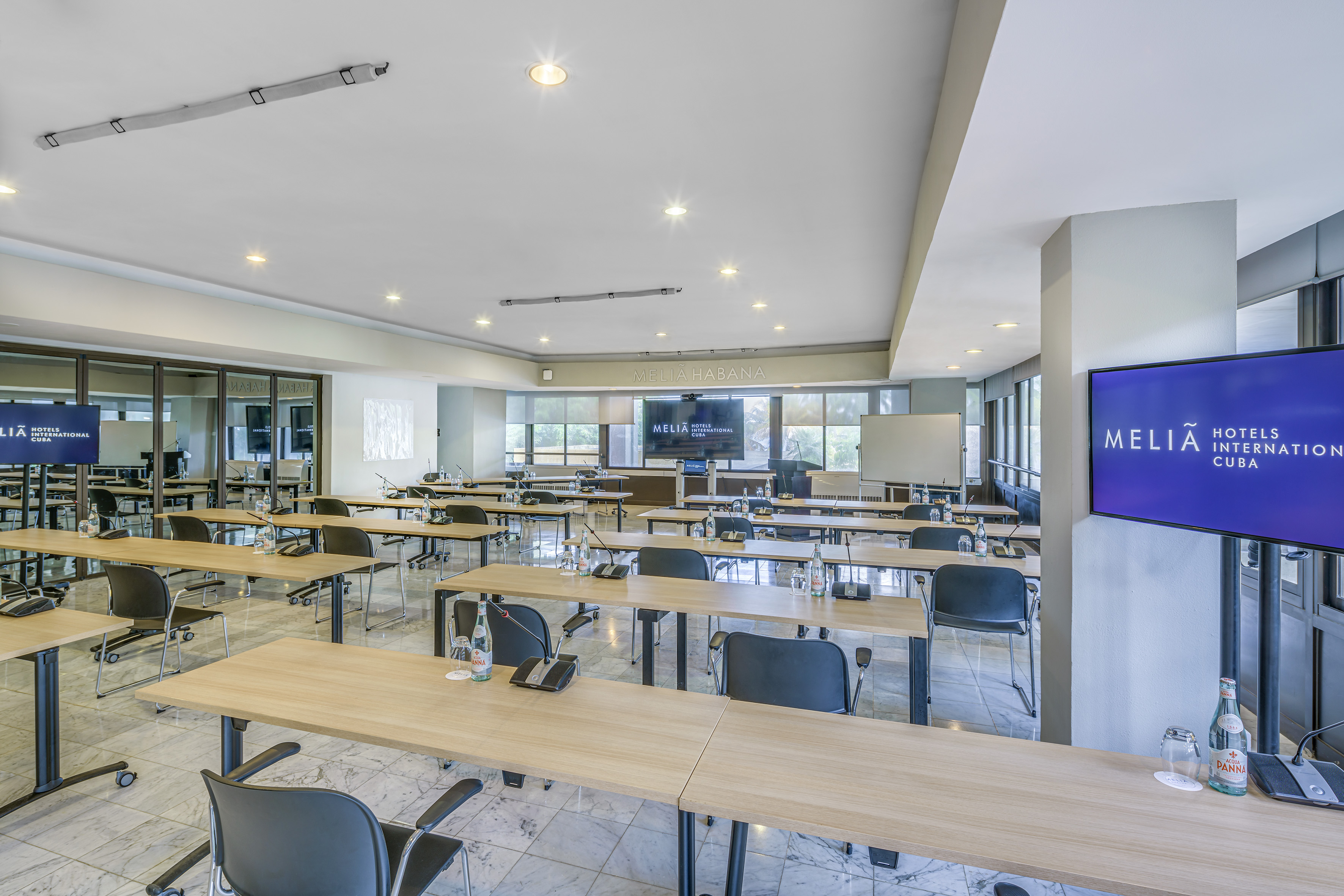 a room with tables and chairs