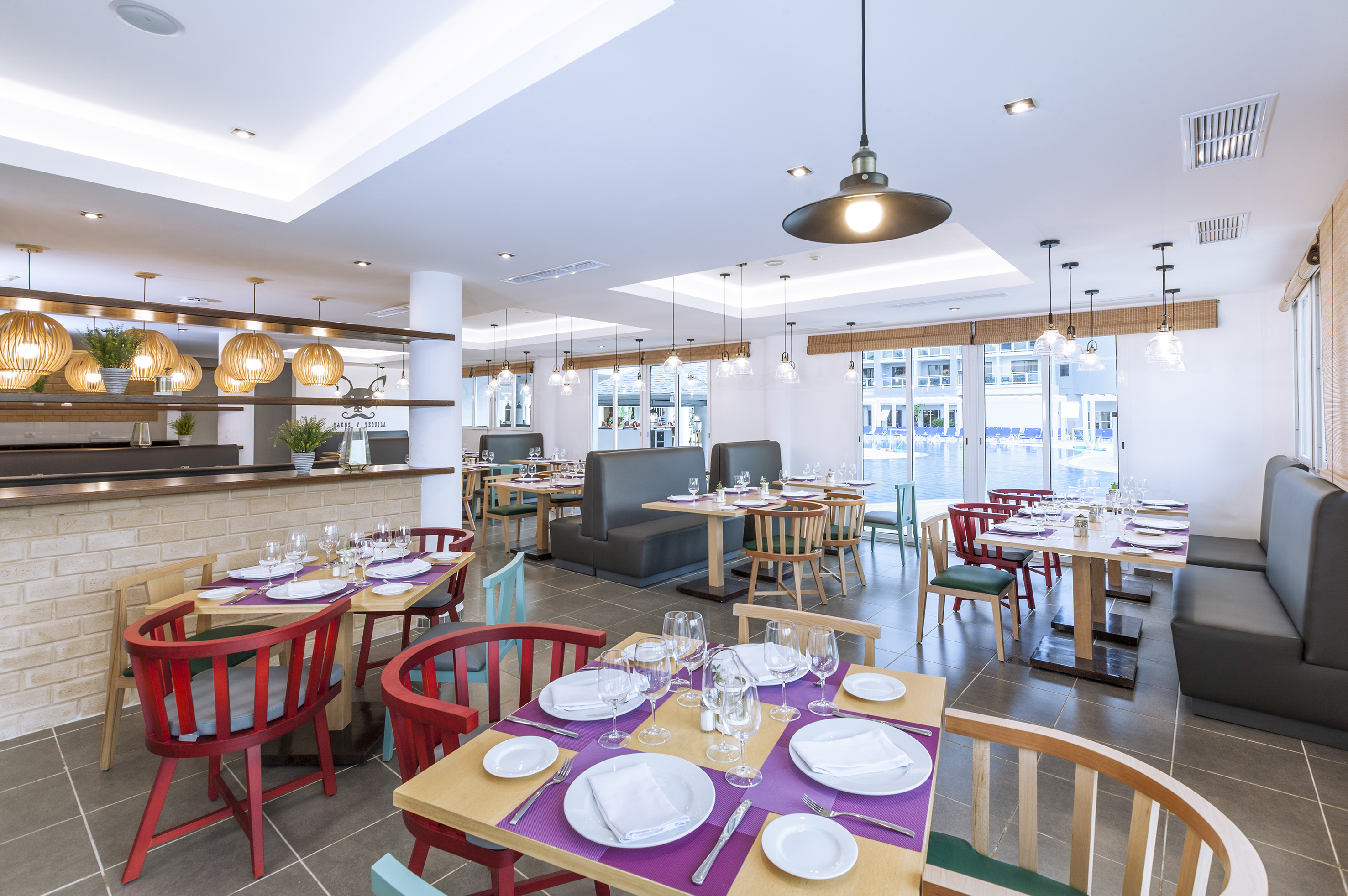 a room with tables and chairs