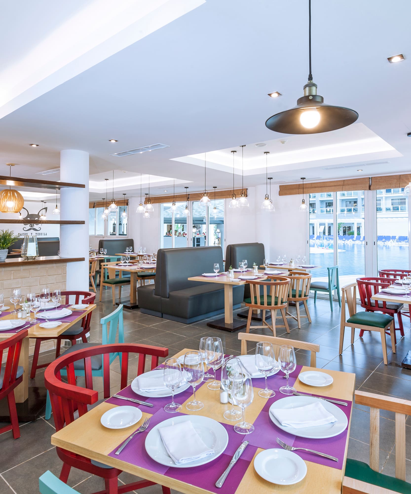 a room with tables and chairs