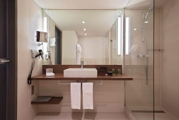 a bathroom with a sink and shower