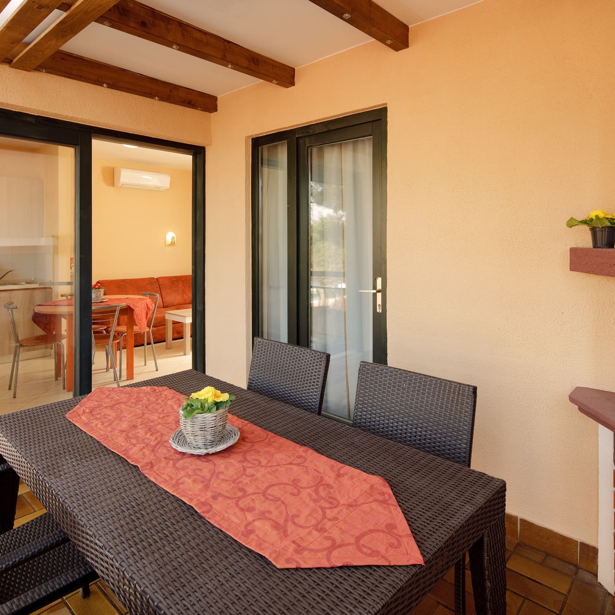 a table and chairs on a patio