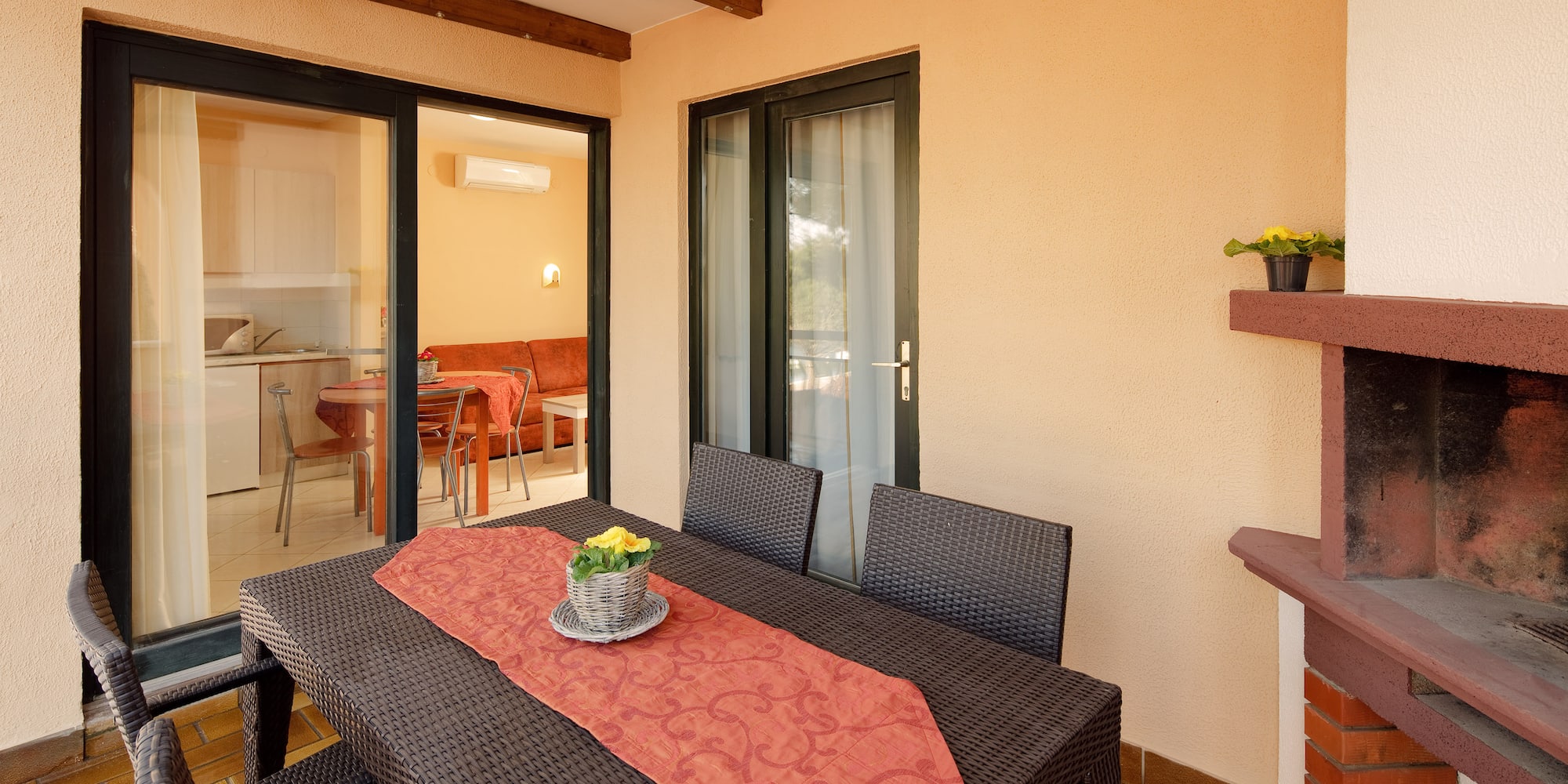 a table and chairs on a patio
