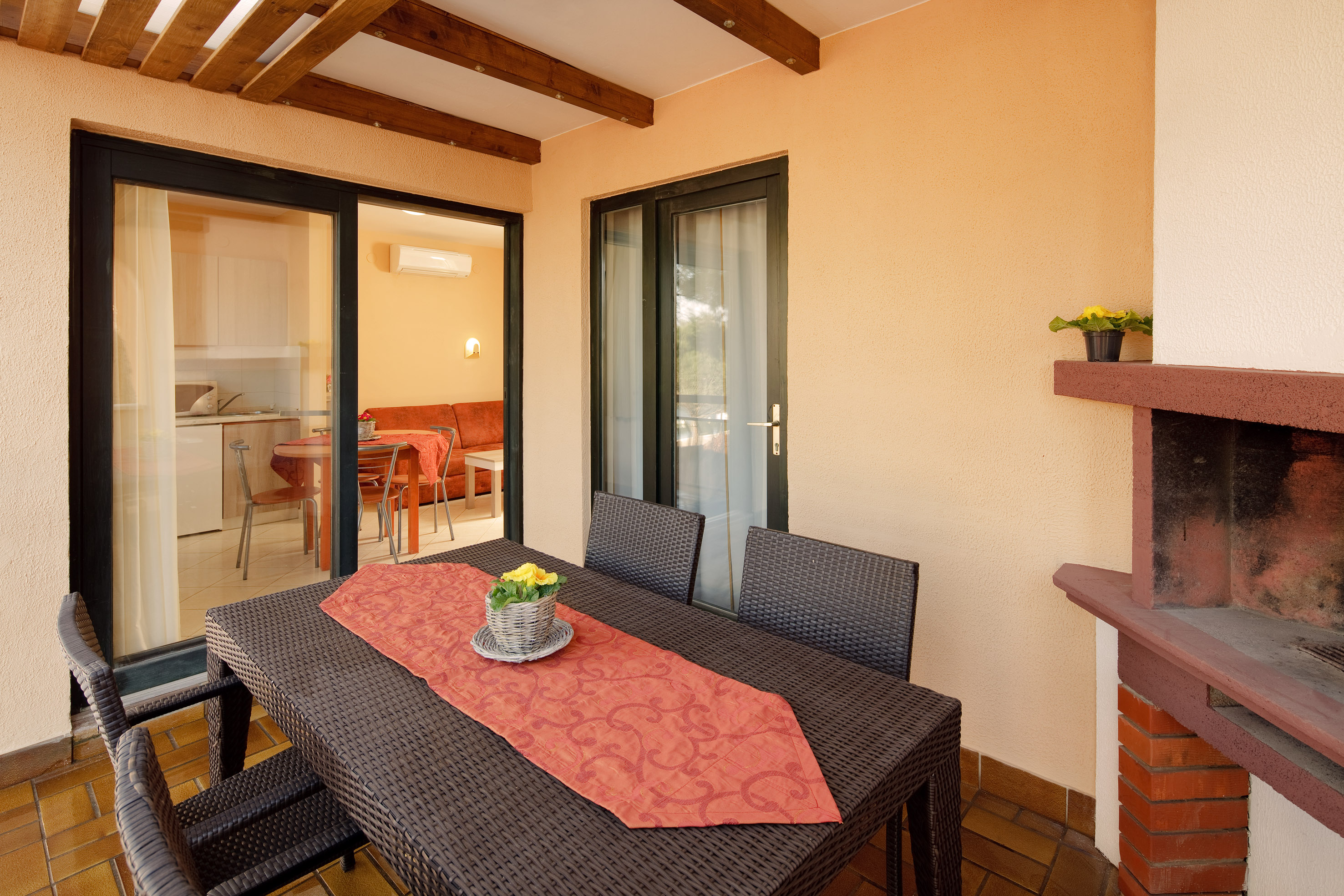 a table and chairs on a patio