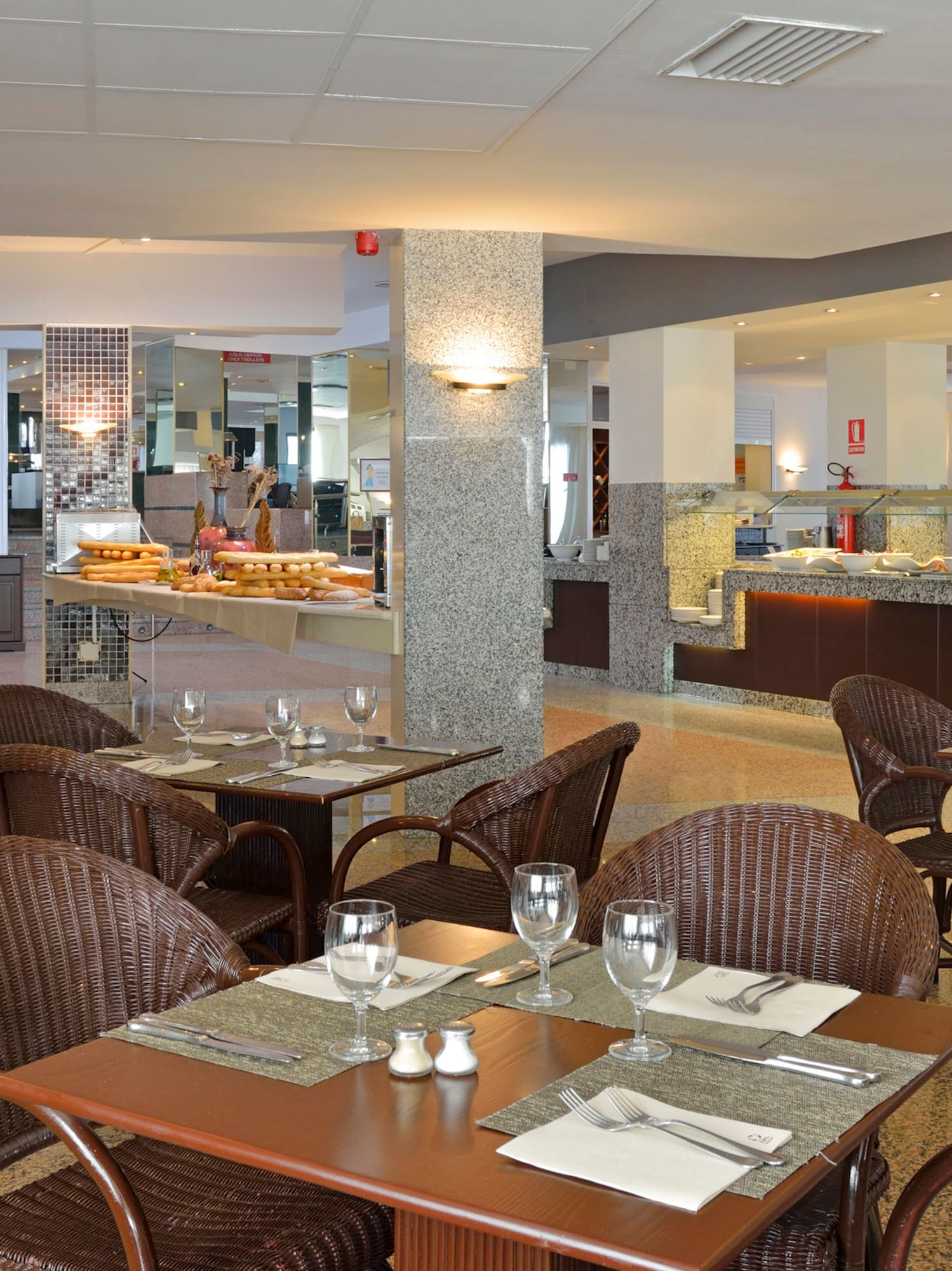 a restaurant with tables and chairs