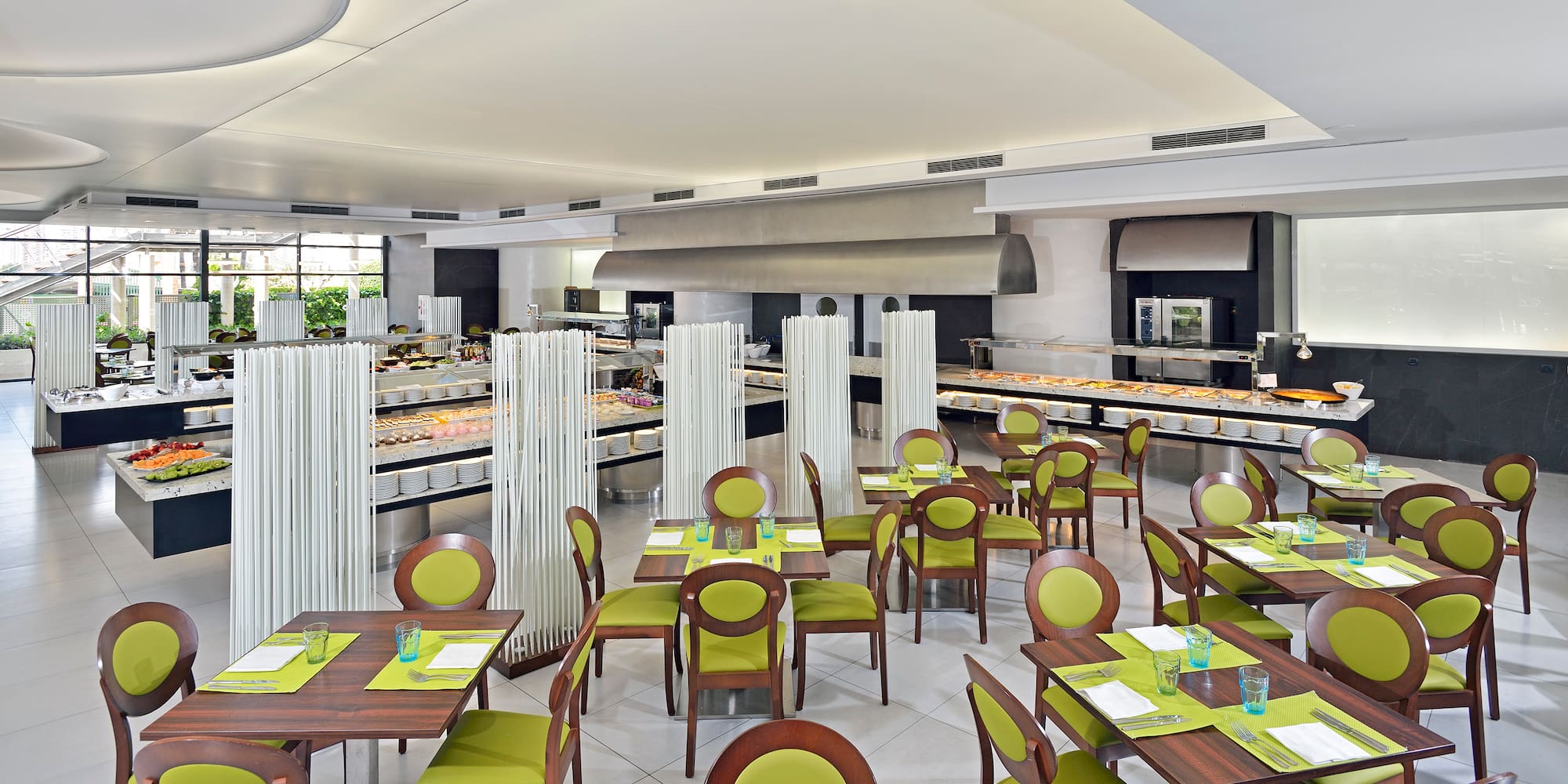 a restaurant with tables and chairs