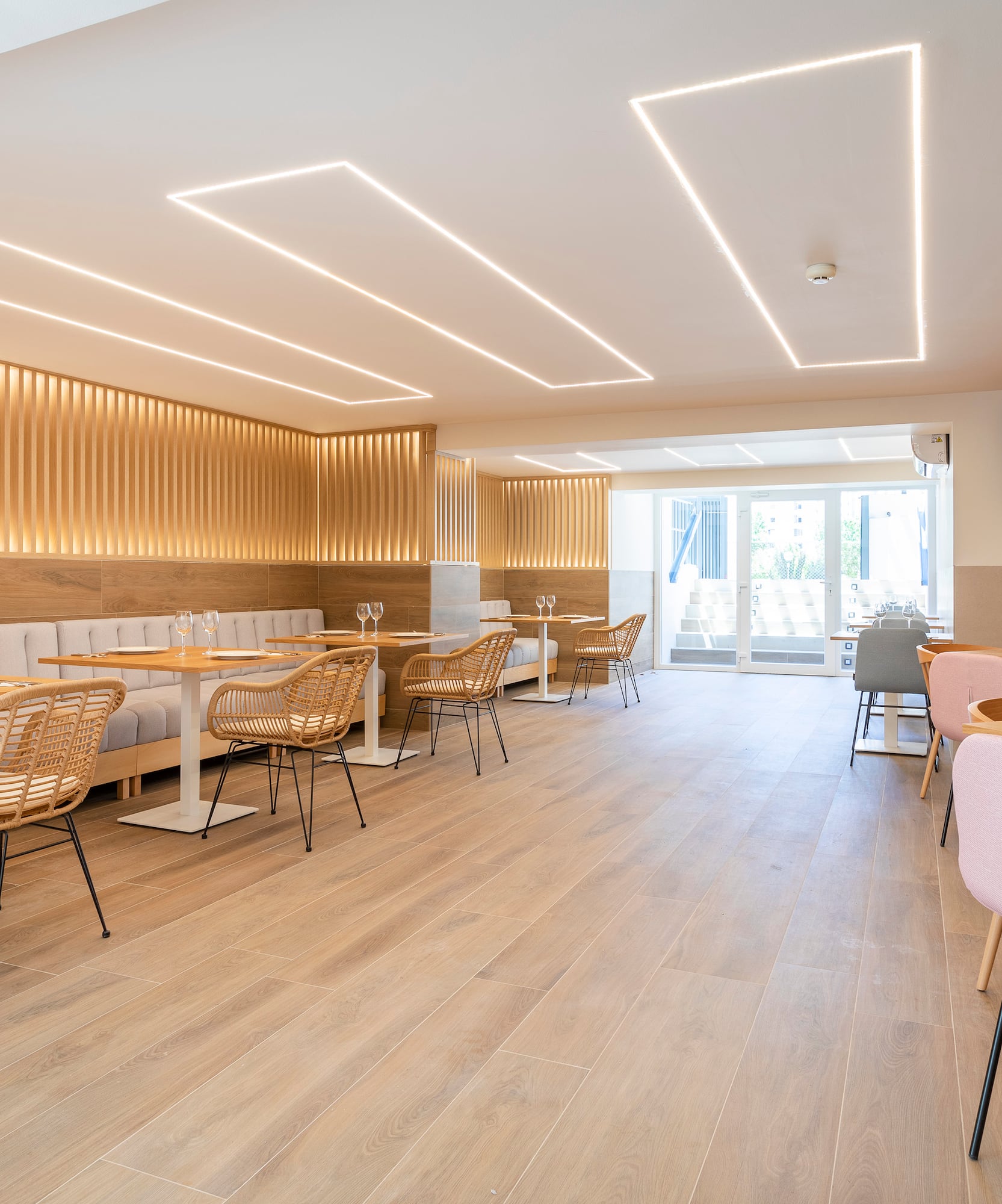 a room with tables and chairs