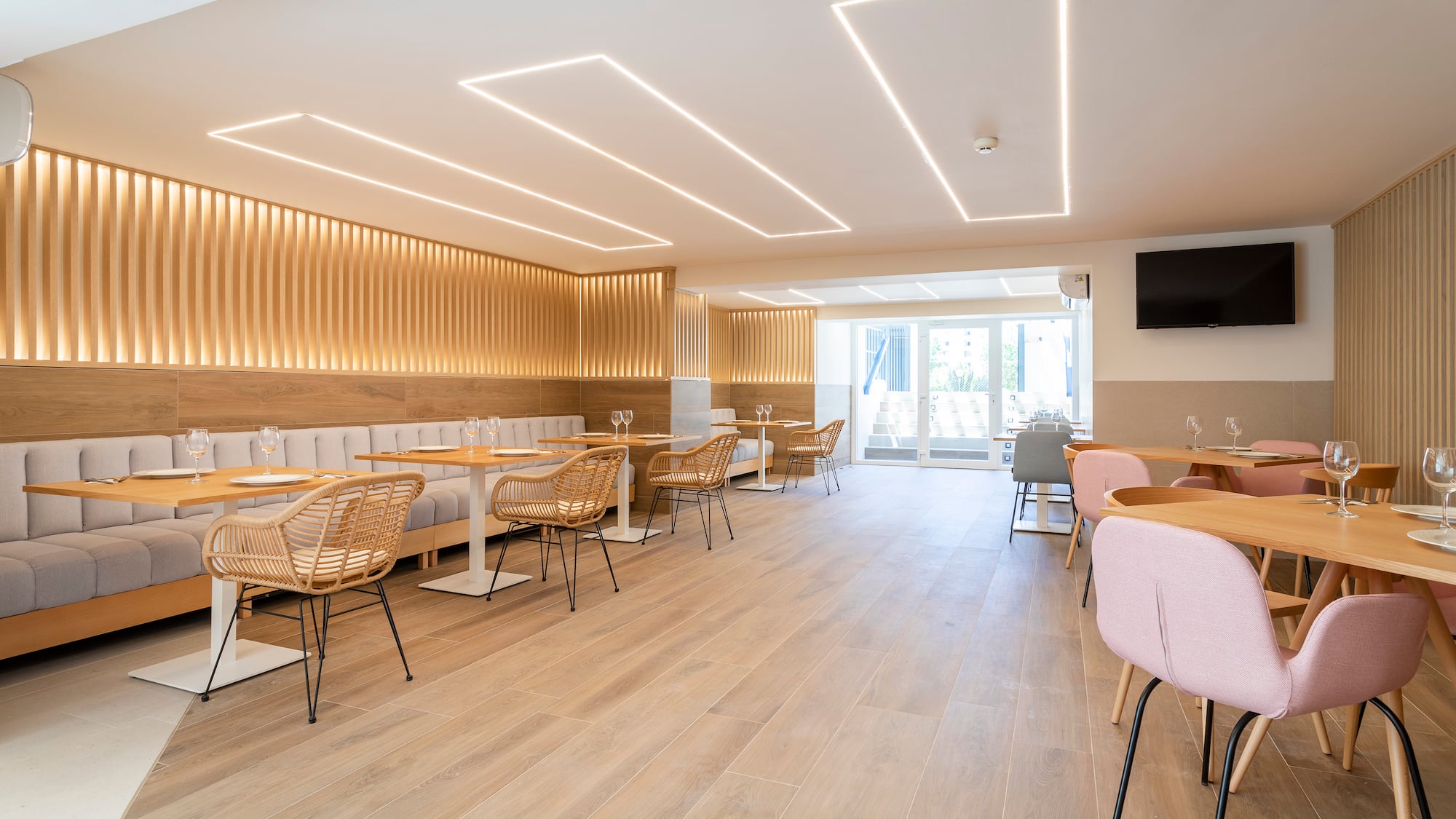 a room with tables and chairs