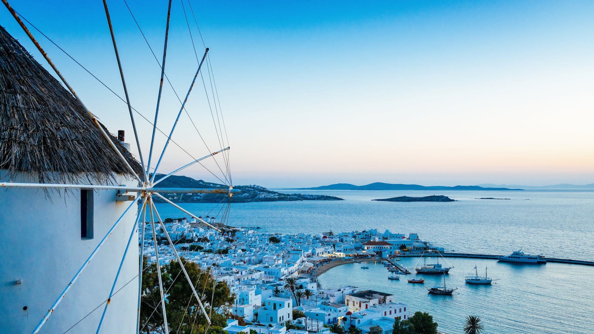 a white buildings and a body of water