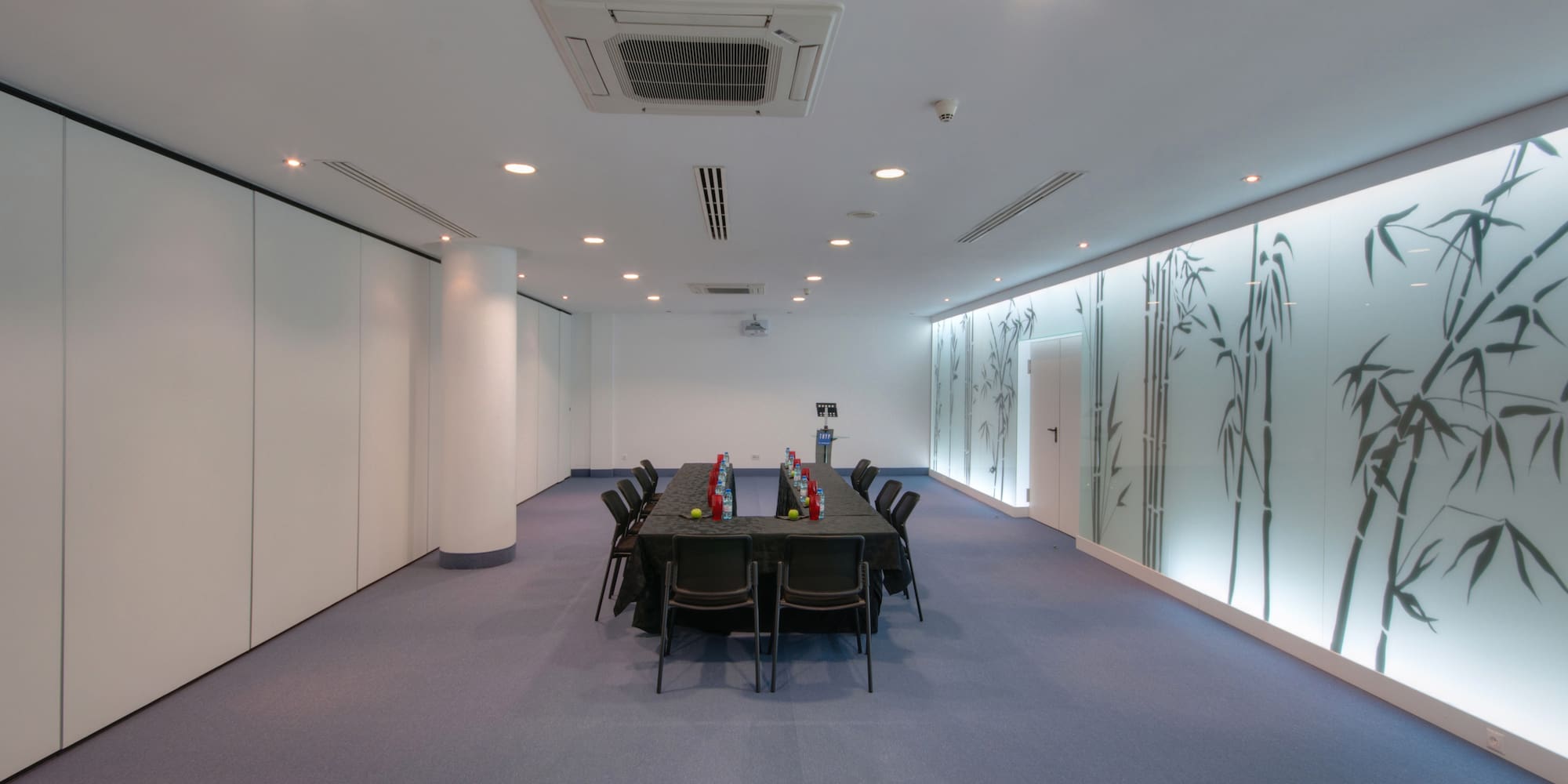 a room with a table and chairs