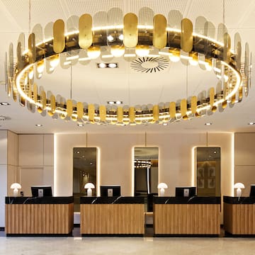 a chandelier in a hotel lobby