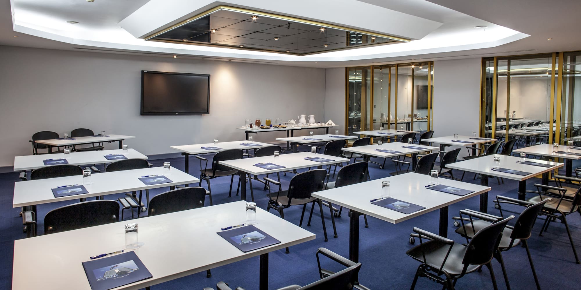 a room with tables and chairs