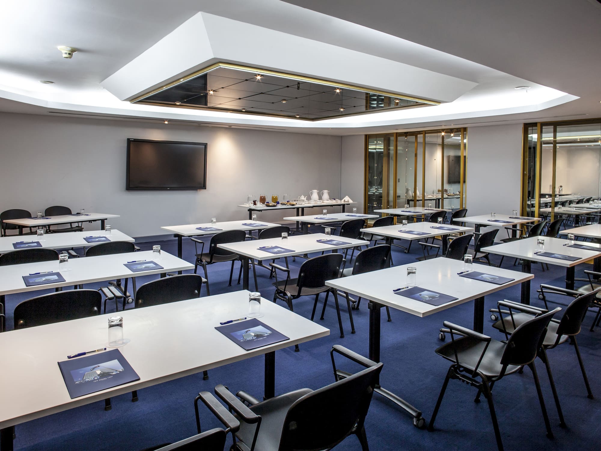 a room with tables and chairs