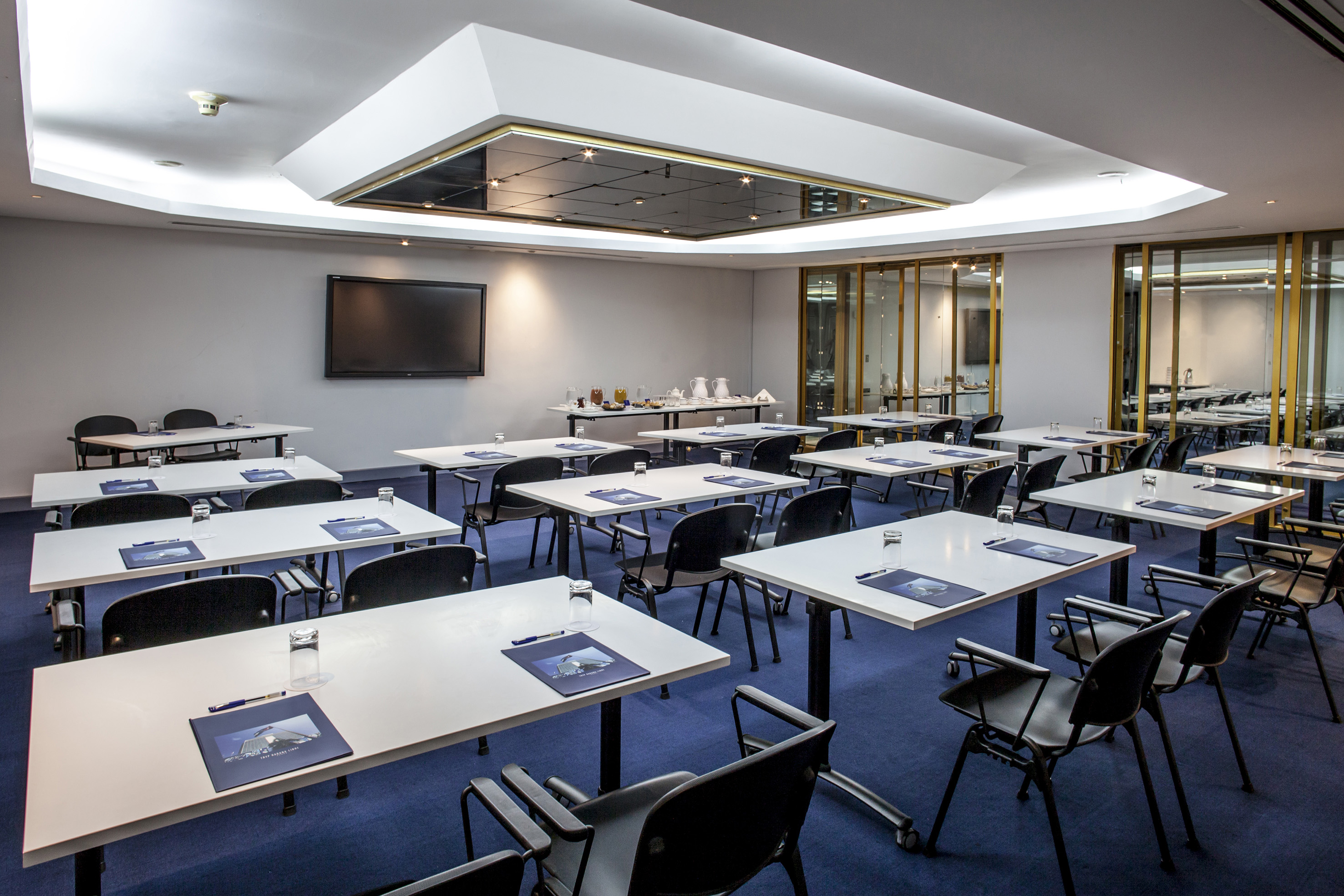 a room with tables and chairs