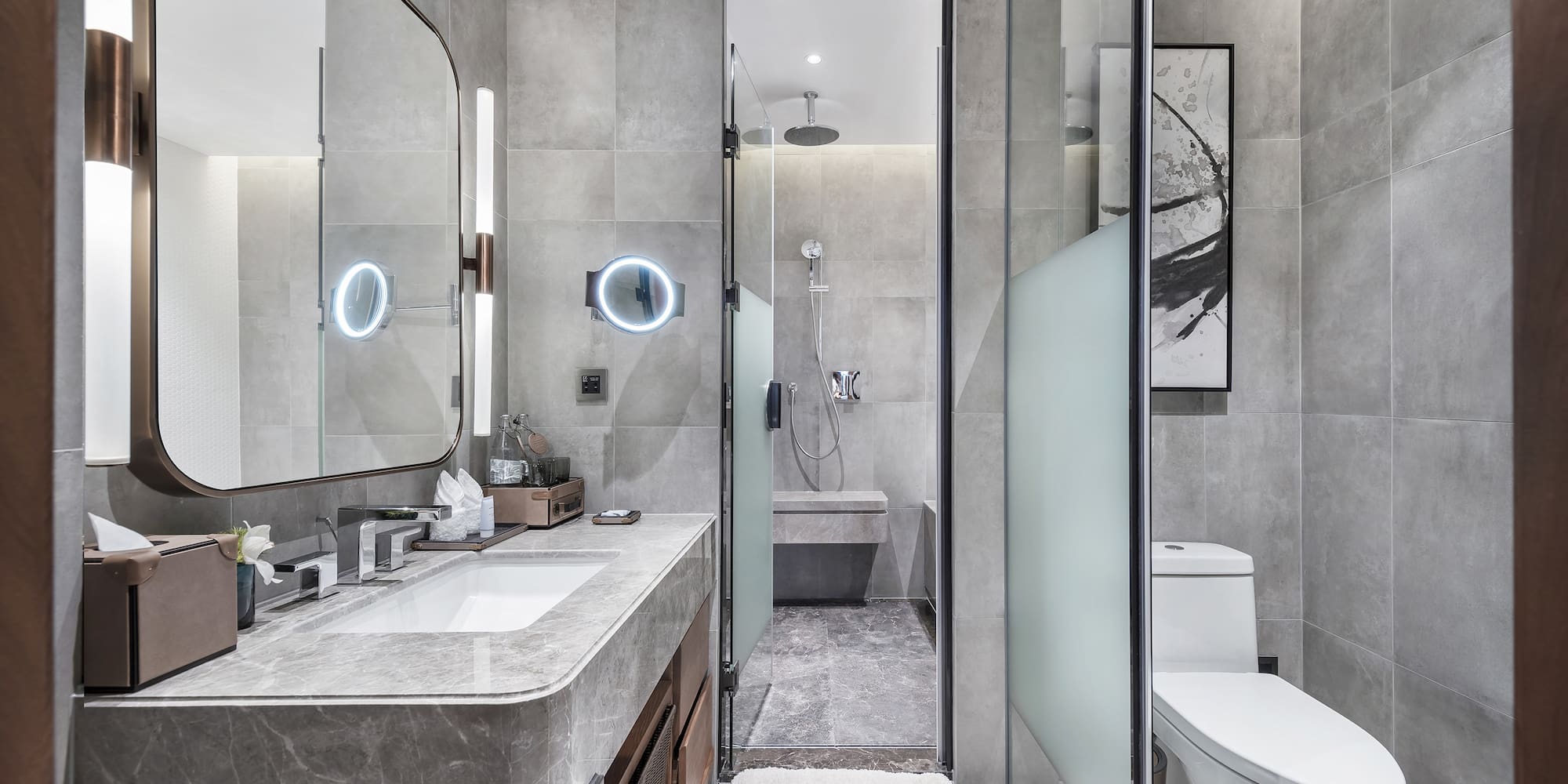 a bathroom with a sink and mirror