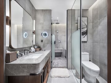 a bathroom with a sink and mirror