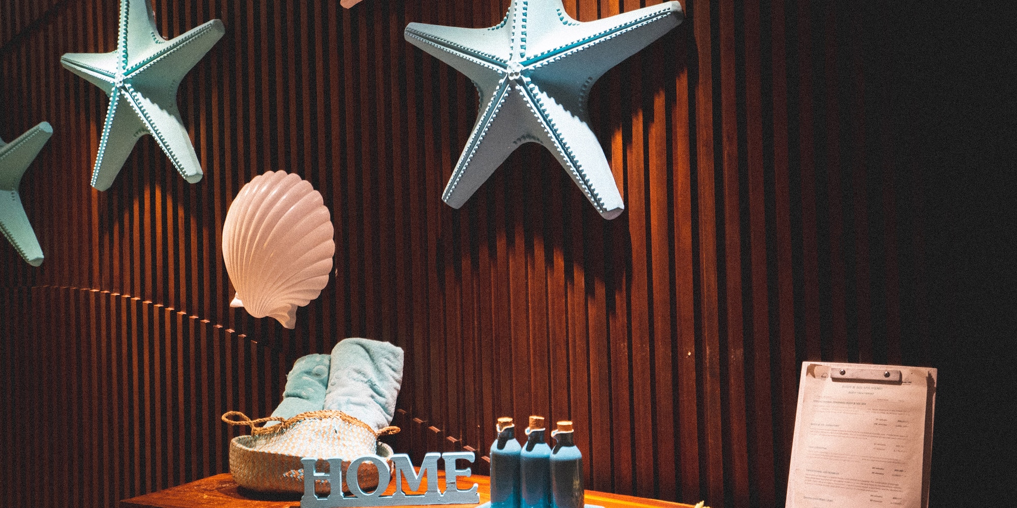 a shelf with starfish and shells on it