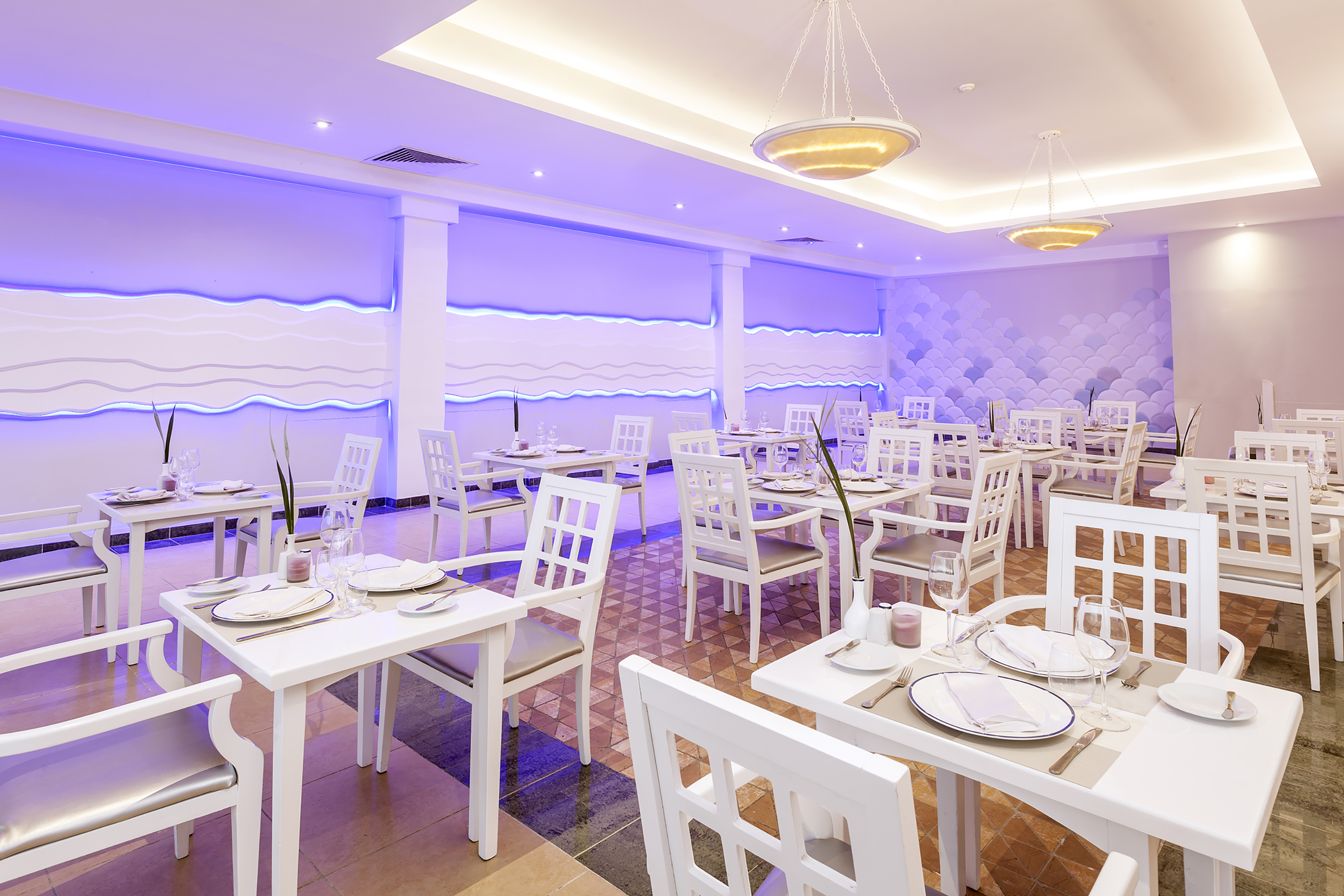 a room with tables and chairs