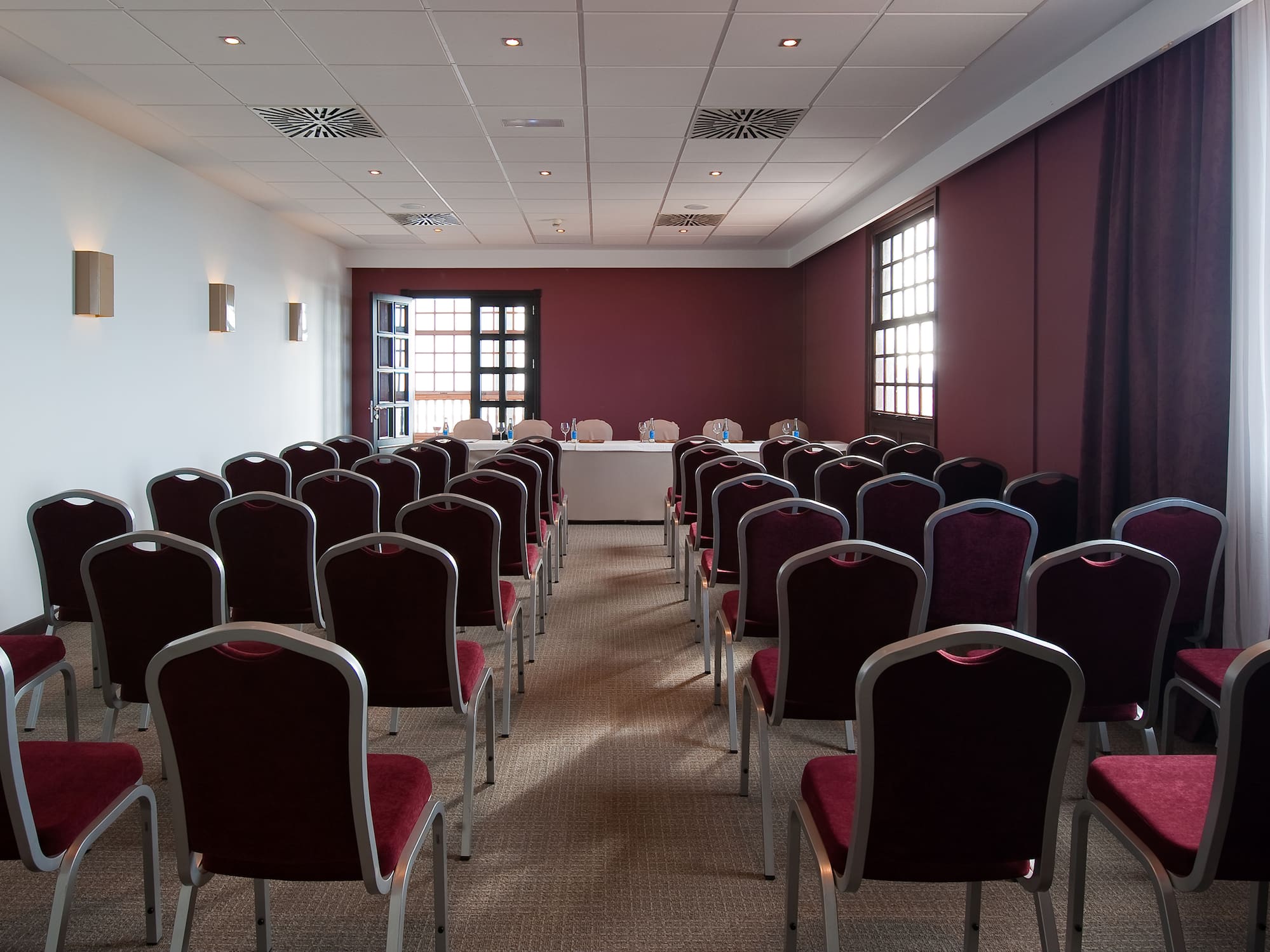 a room with rows of chairs