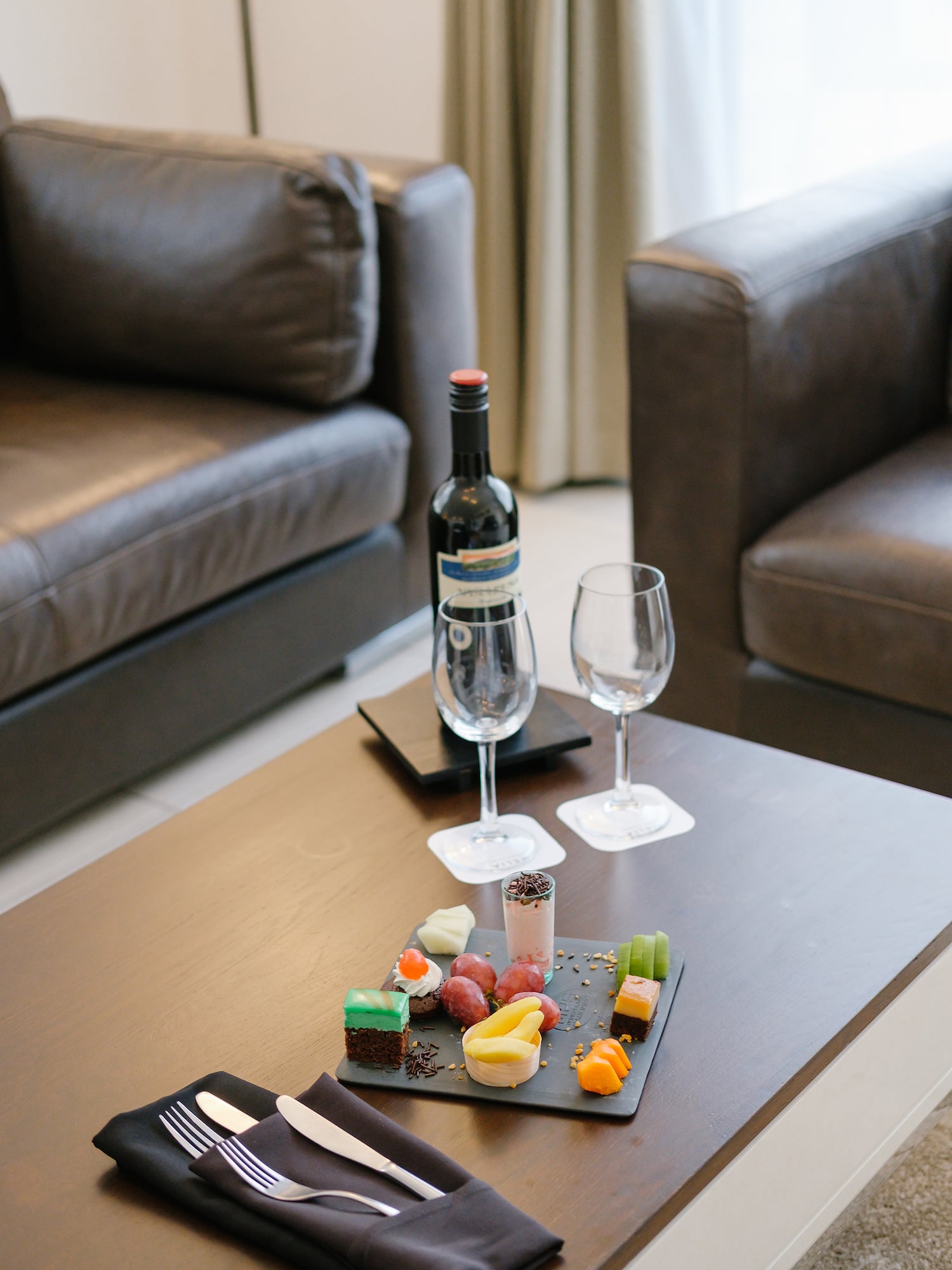 a table with food and wine on it