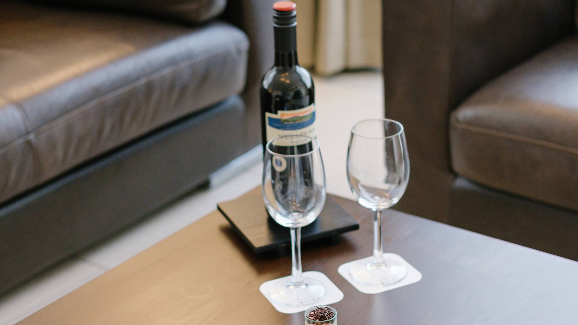 a table with food and wine on it