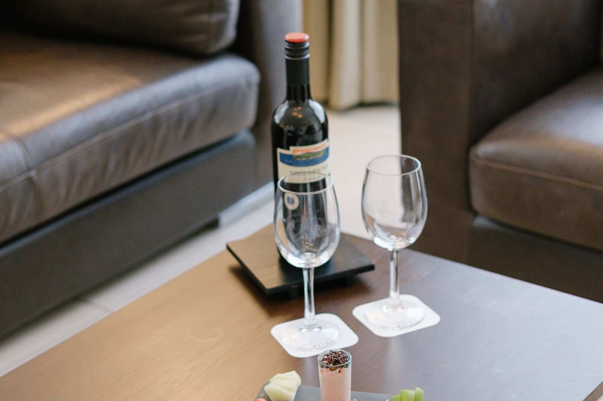 a table with food and wine on it