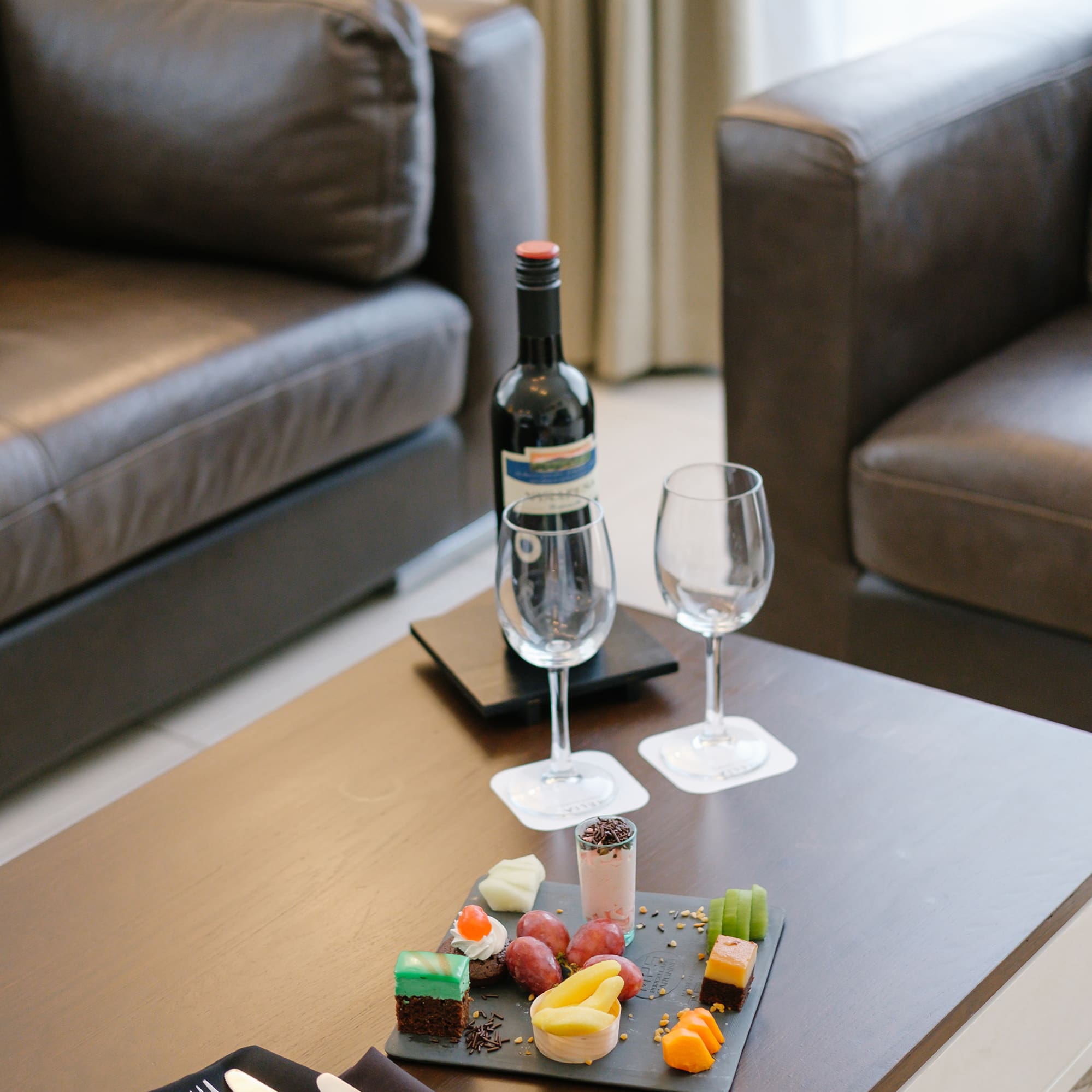 a table with food and wine on it