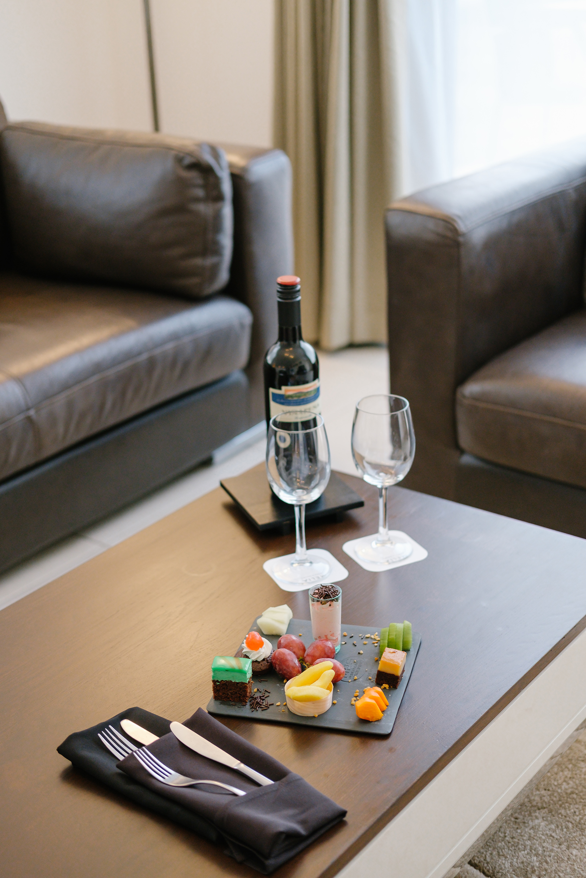 a table with food and wine on it