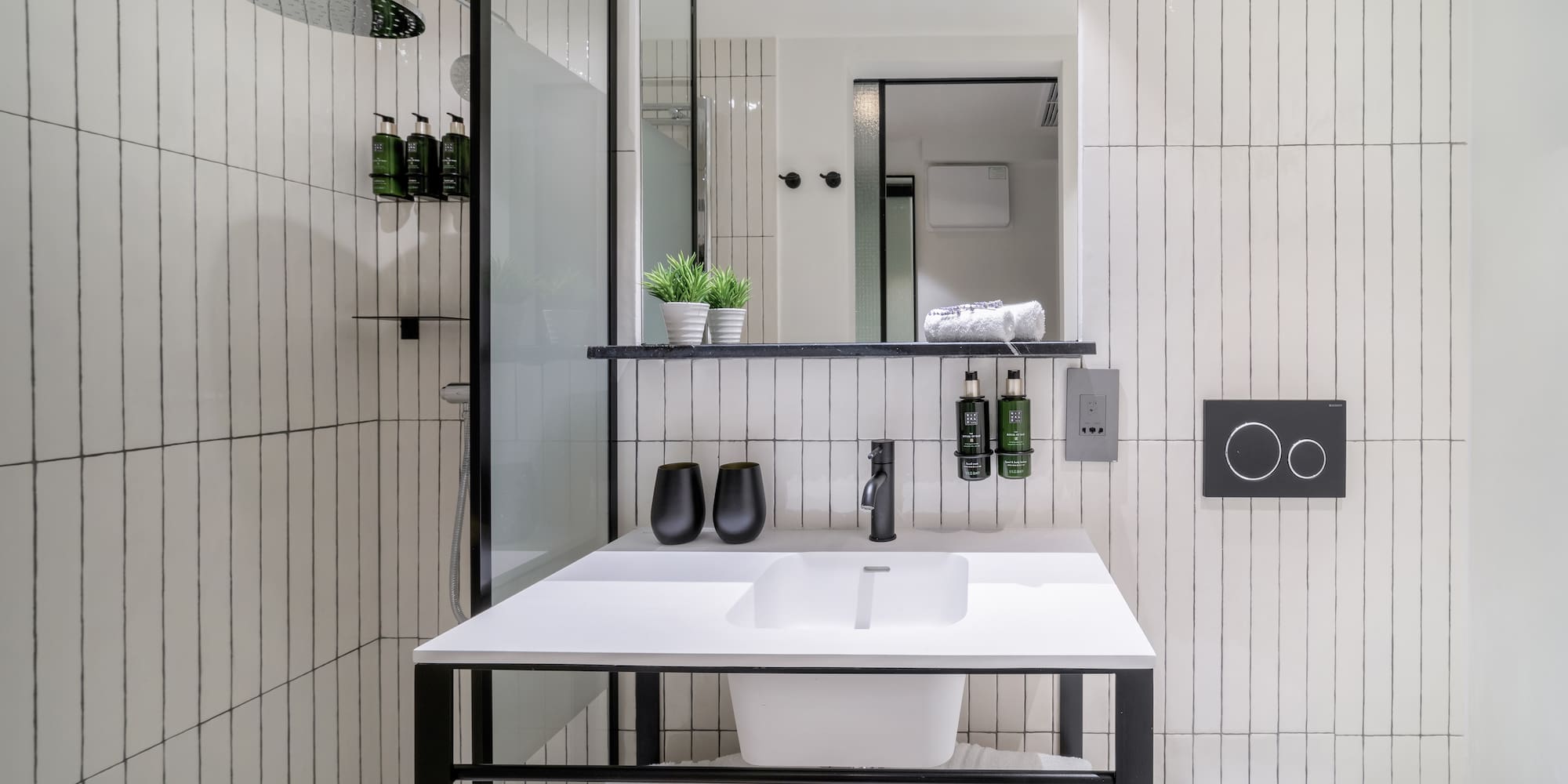 a bathroom with a sink and toilet