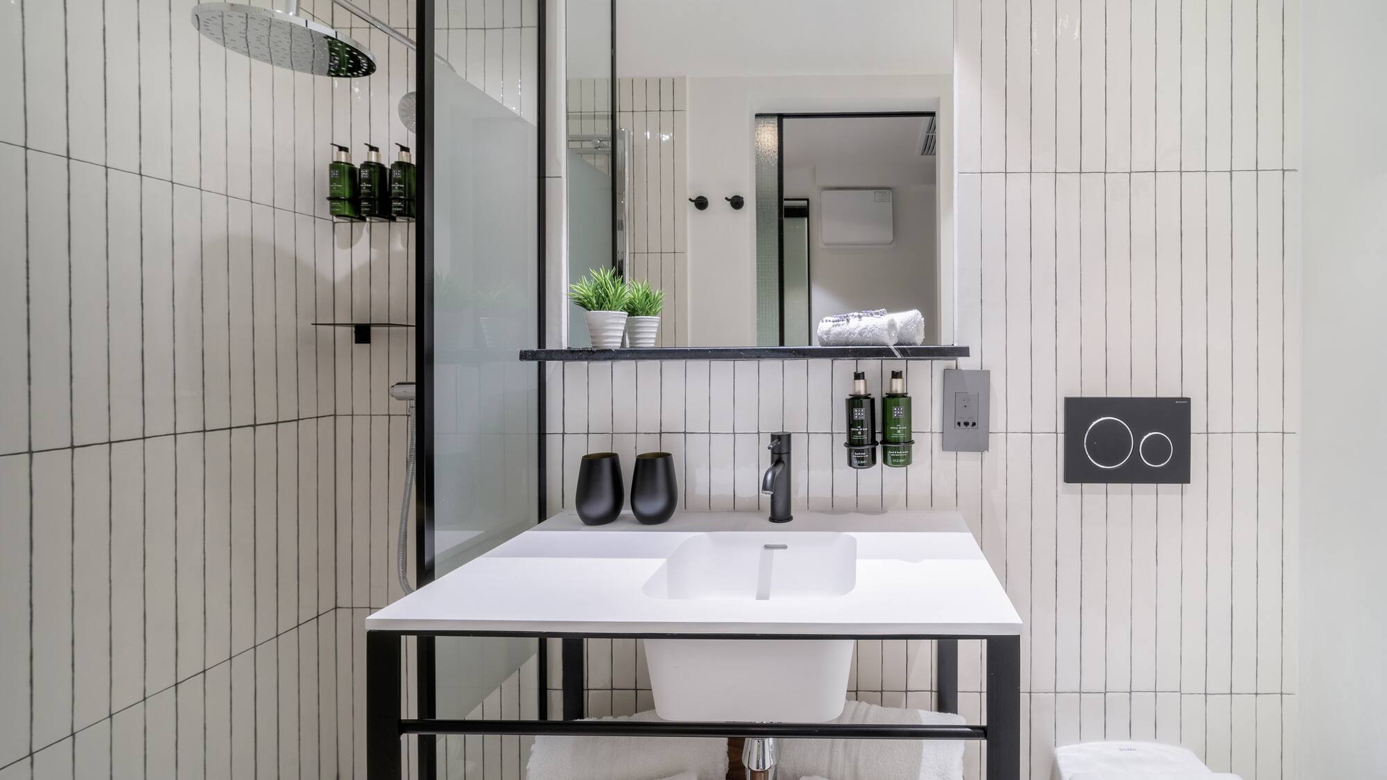 a bathroom with a sink and toilet