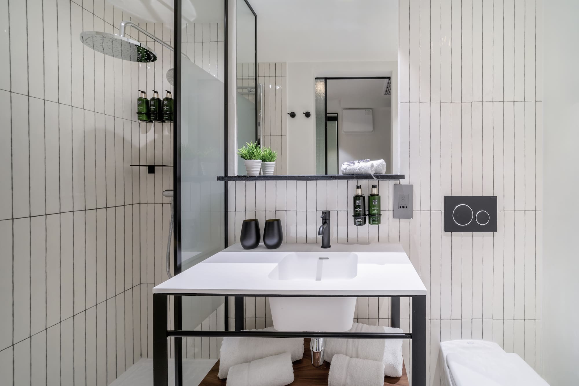 a bathroom with a sink and toilet