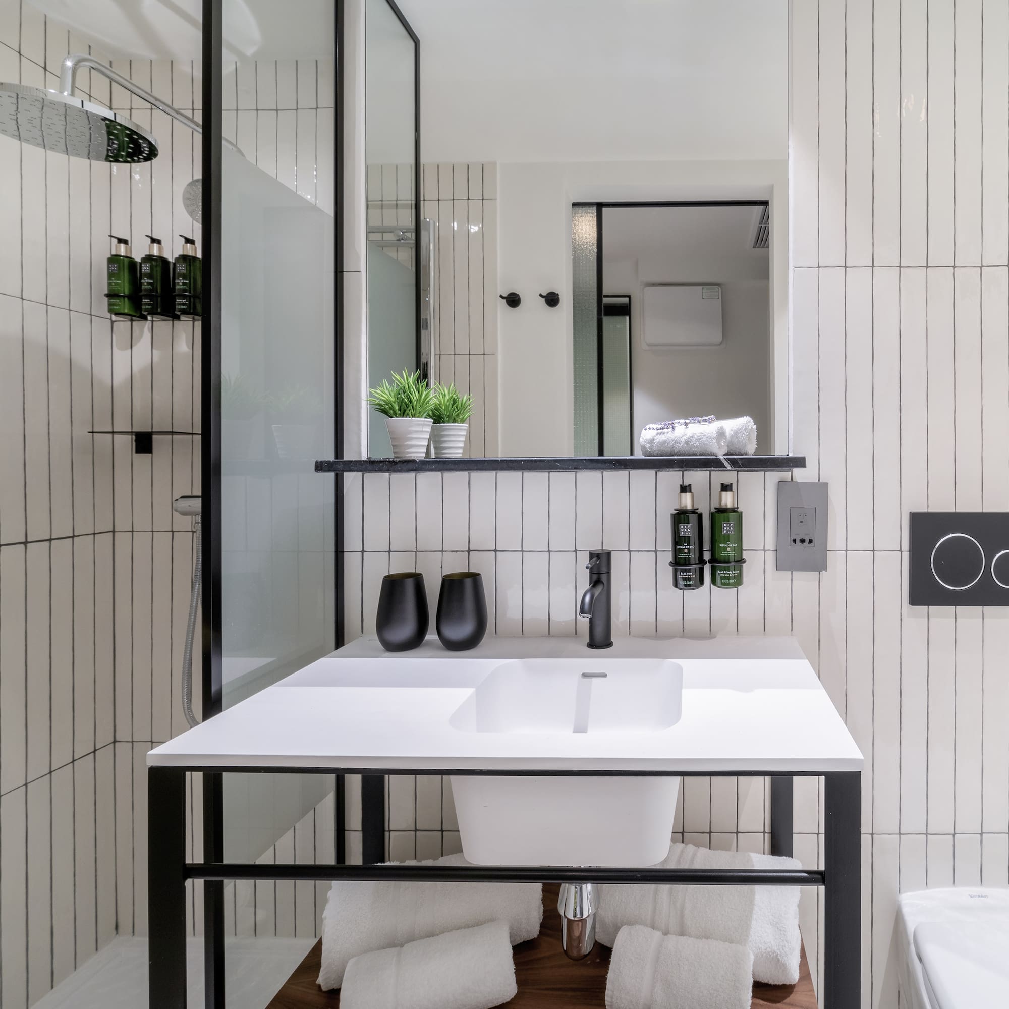 a bathroom with a sink and toilet