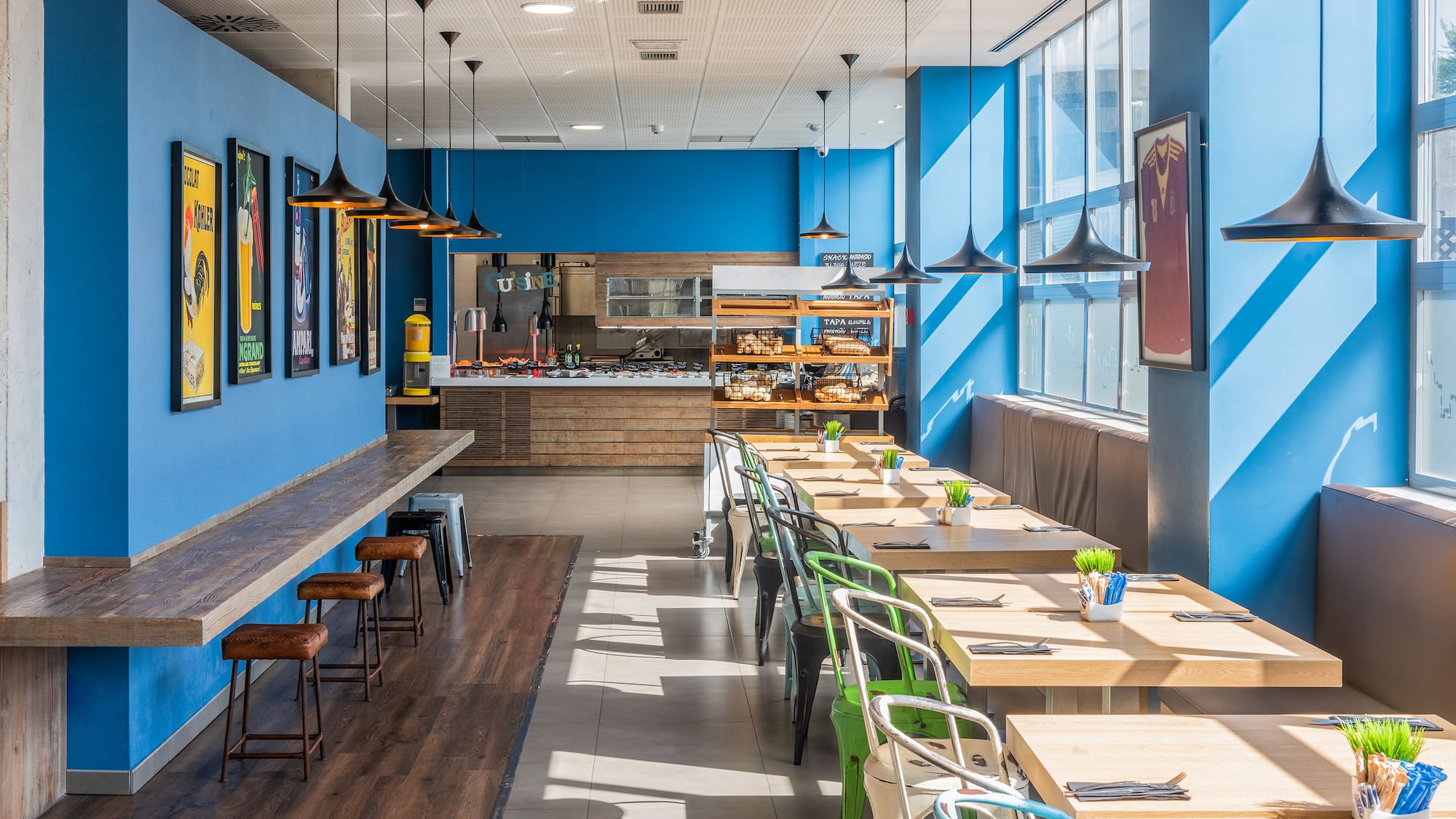 a room with tables and chairs