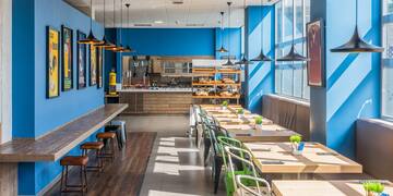 a room with tables and chairs