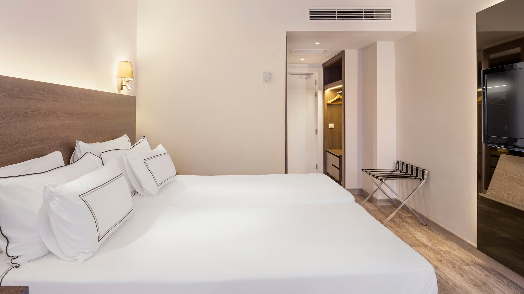 a bed in a hotel room