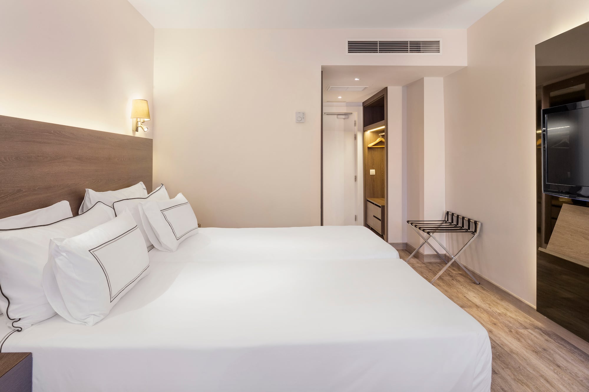 a bed in a hotel room