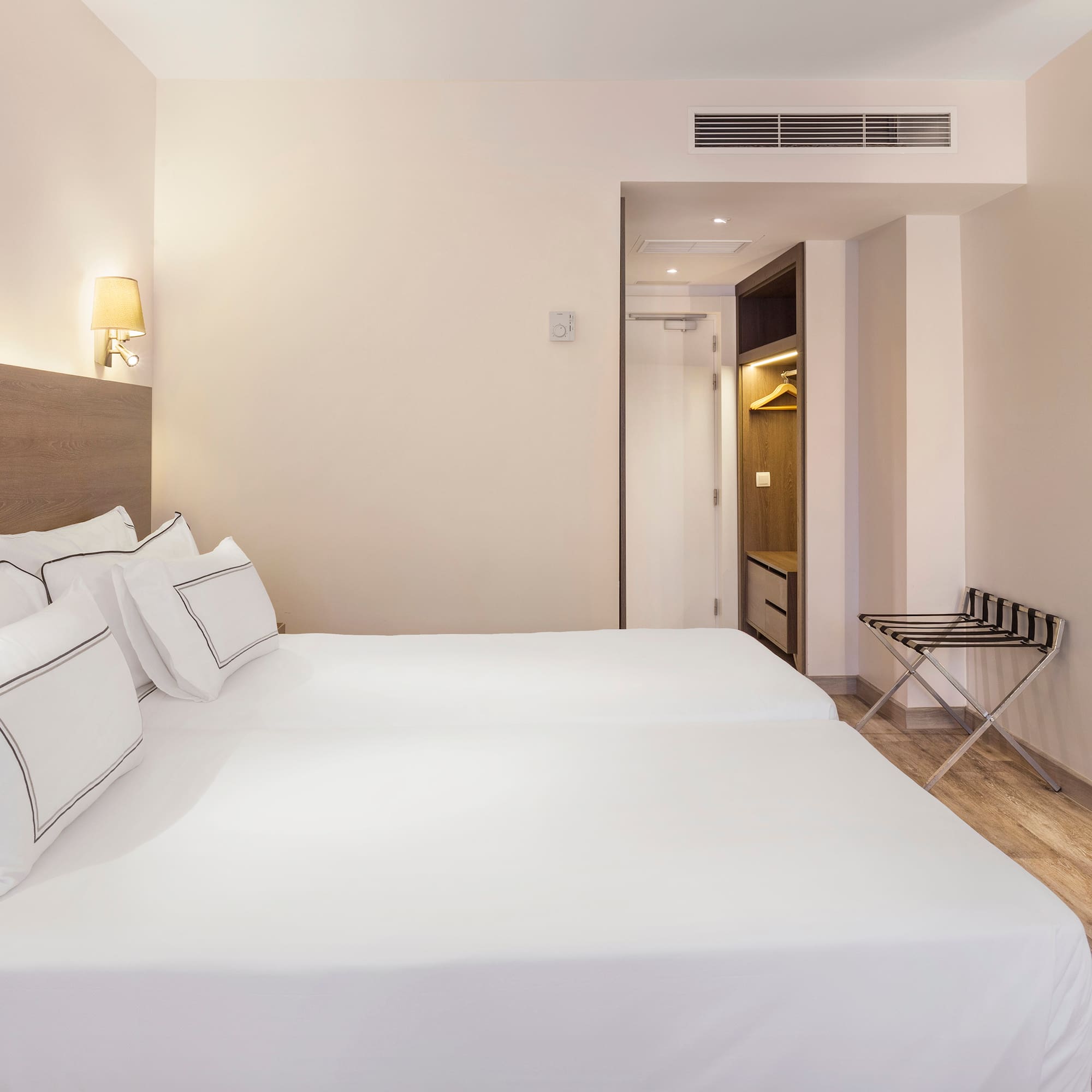 a bed in a hotel room