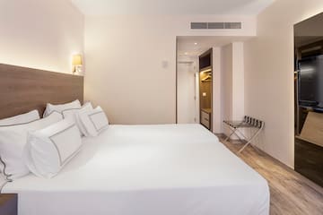 a bed in a hotel room