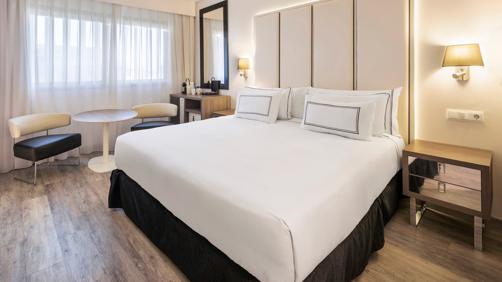 a room with a bed and a table