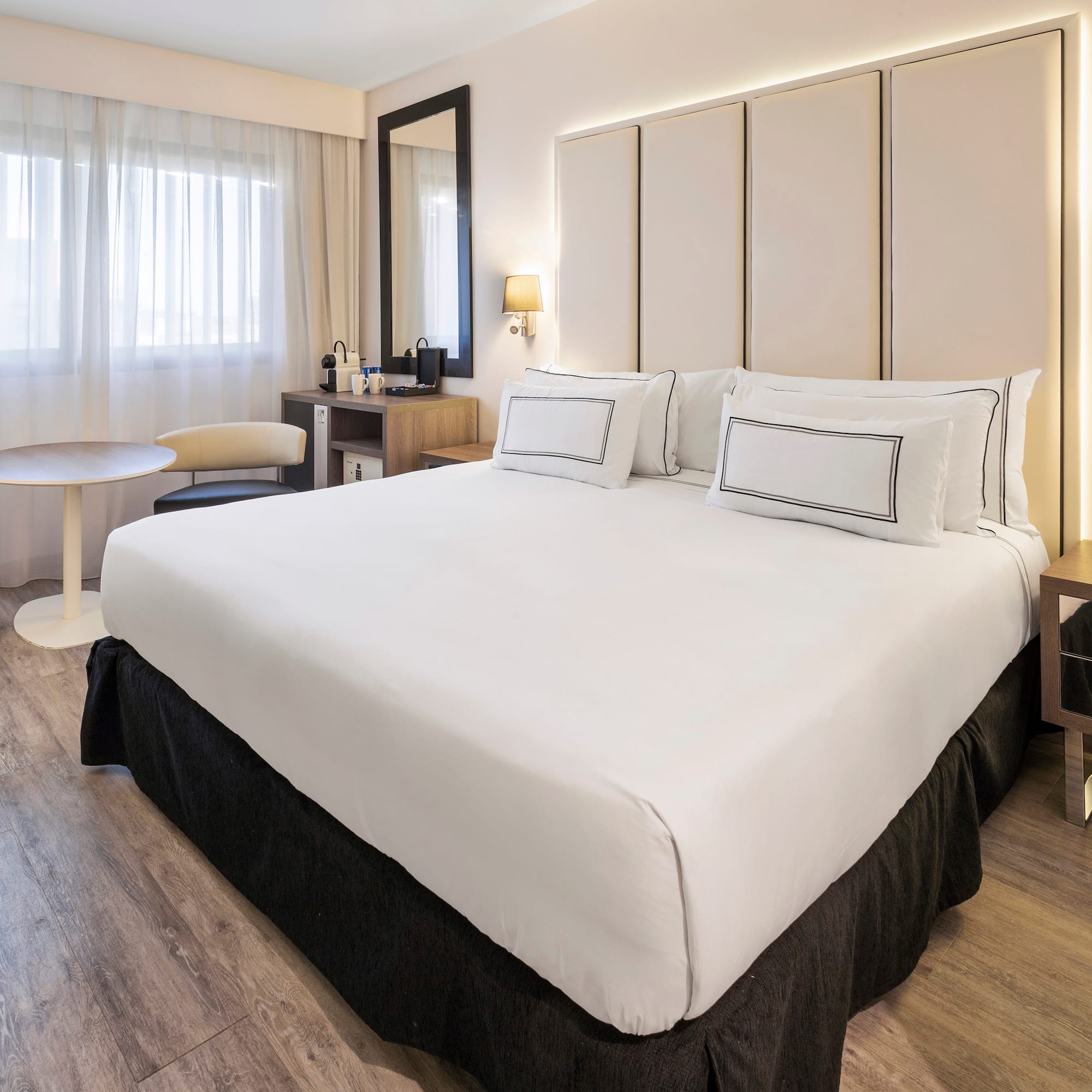 a room with a bed and a table