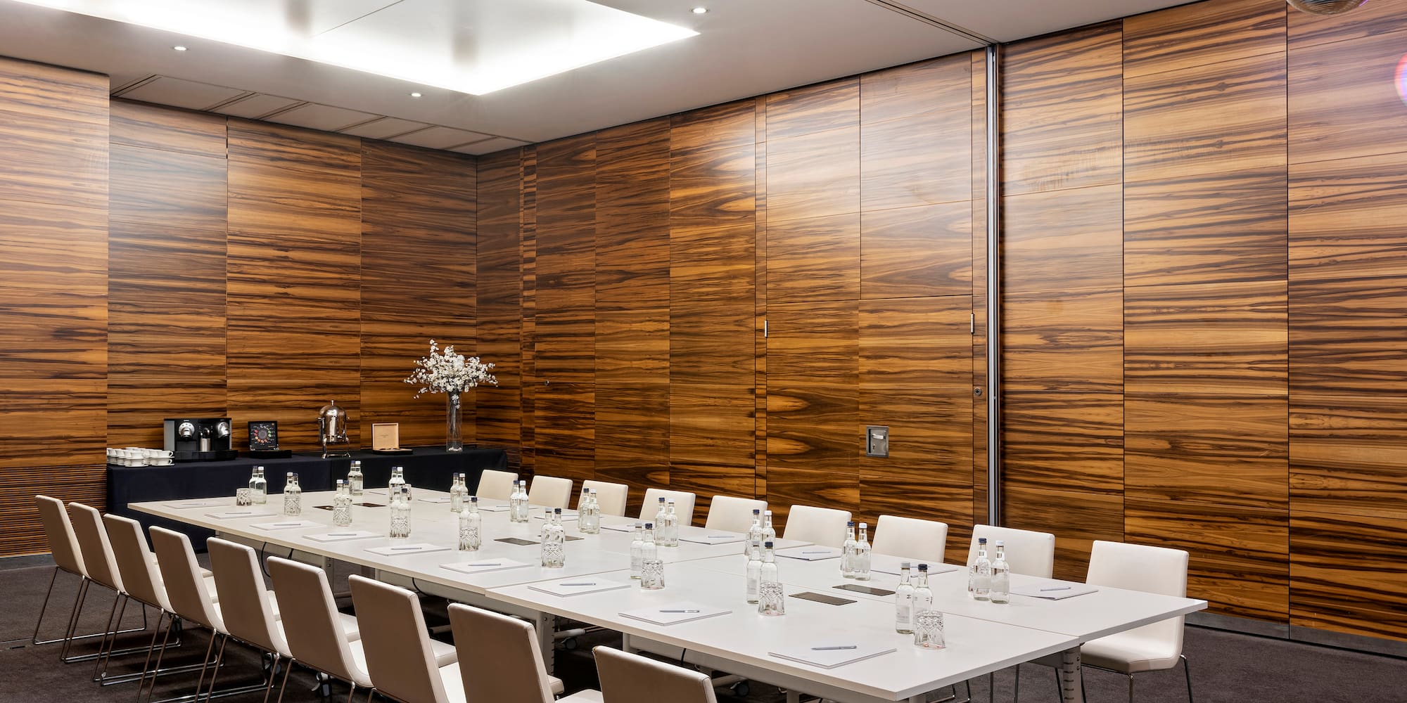 a room with a table and chairs