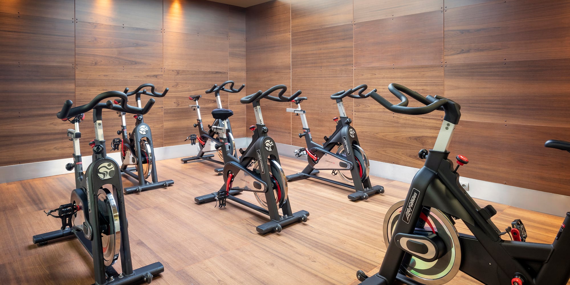a room with exercise bikes