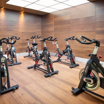 a room with exercise bikes