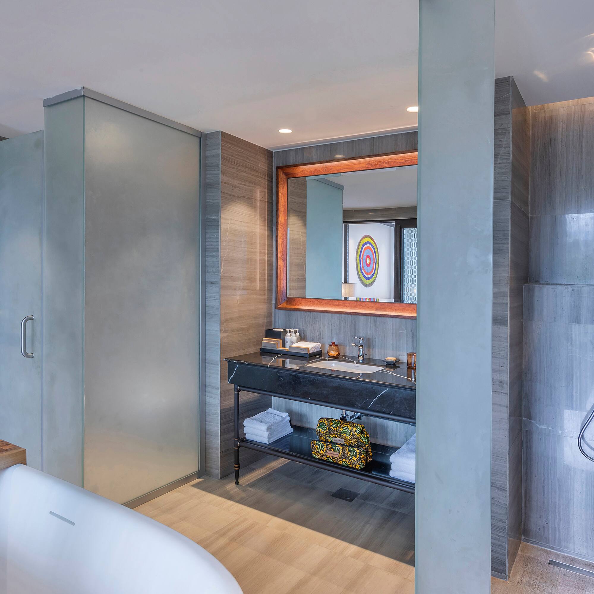 a bathroom with a tub and sink